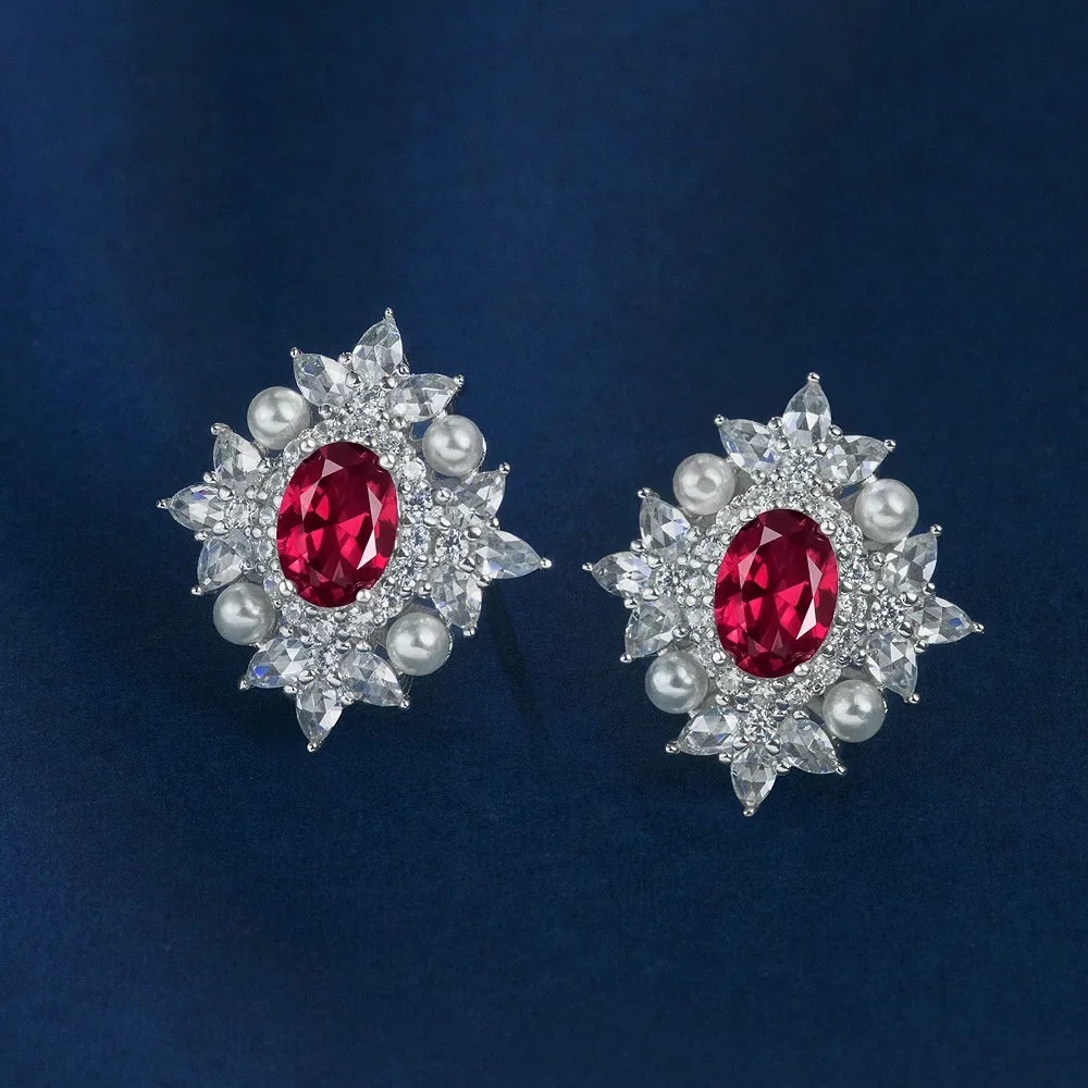 

HOT SALE S925 silver egg shaped 7 * 9 red/blue/green gemstone 2-carat retro palace light luxury earrings wedding jewelry