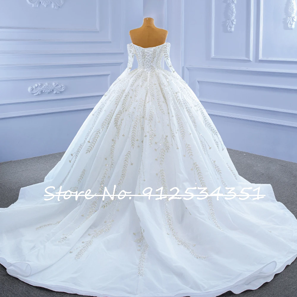 Robe Mariage แขนยาว Tulle ชุดราตรีงานแต่งชุดปิดไหล่ Shining Vestidos De Novia Sequined ประดับด้วยลูกปัด Trouwjurk