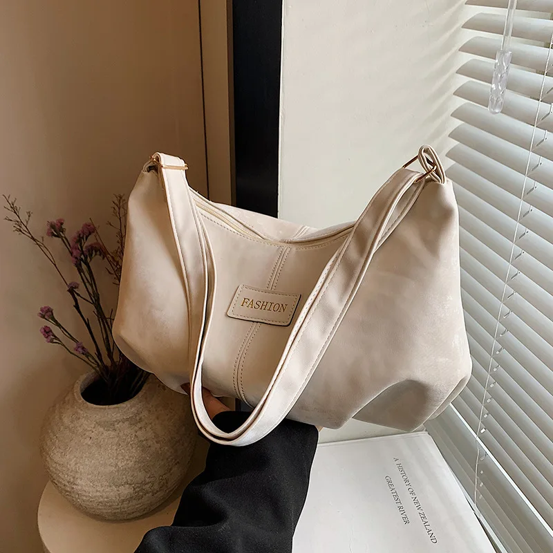 Bolso de mano informal de gran capacidad para mujer, bolsa de hombro Simple, versión coreana, nueva moda de primavera y verano, 2024