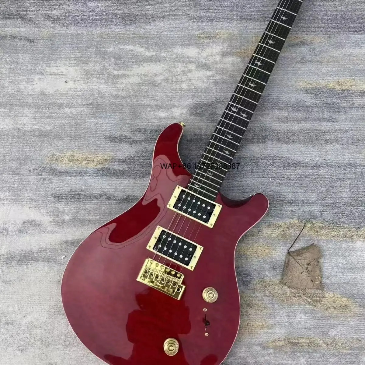 

Transparent Red Electric Guitar Mahogany Body Single-Pickup Gold Accessories Water Ripple Finish Entry-Level Factory Guitar
