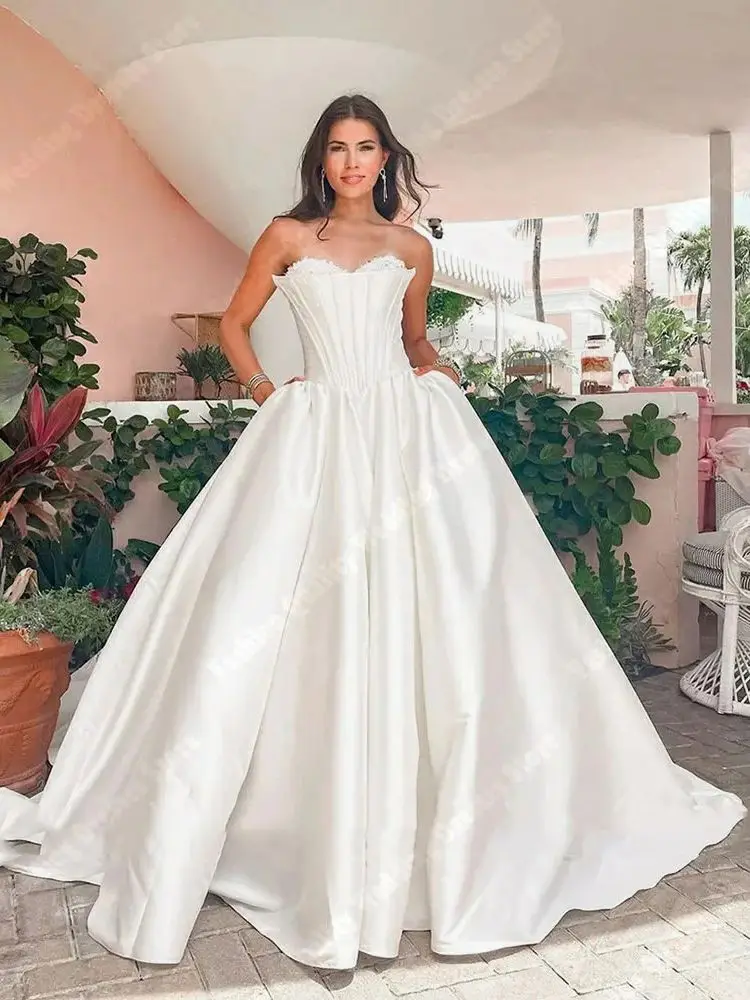 Lussuosi abiti da sposa da donna con superficie in raso abiti da ballo in tessuto lucido 2024 la più recente gonna soffice orli Princess Vestidos De Novias