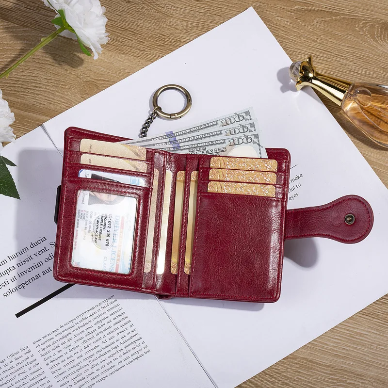 Damesportemonnees PU-leer Vrouwelijke portemonnee Hasp Korte tweevoudige portemonnee voor dames Mode Kaarthouder met ritssluiting Broekzak Sleutelhanger