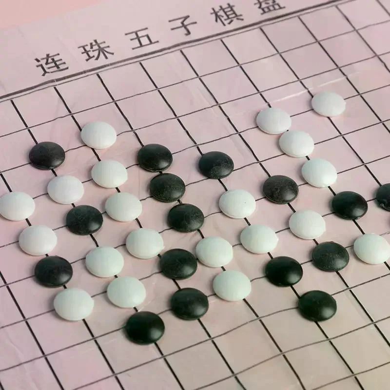 

Gomoku (Five In A Row) Set With Black And White Pieces And Board