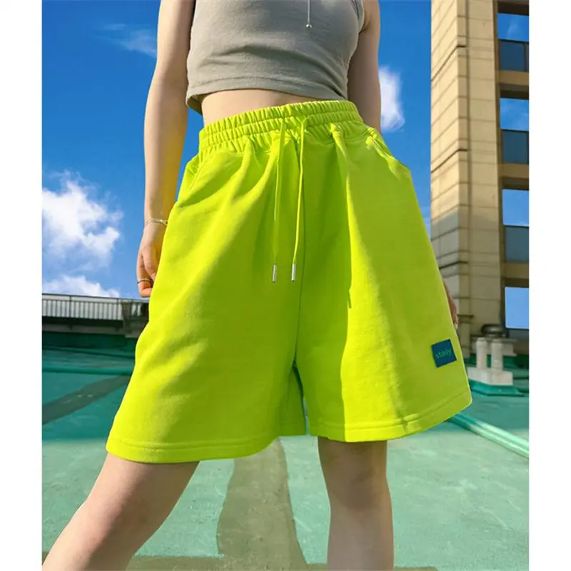 Pantaloni a cinque punte a gamba larga con coulisse a vita alta estiva colorata con dopamina Pantaloncini casual slim di grandi dimensioni da donna