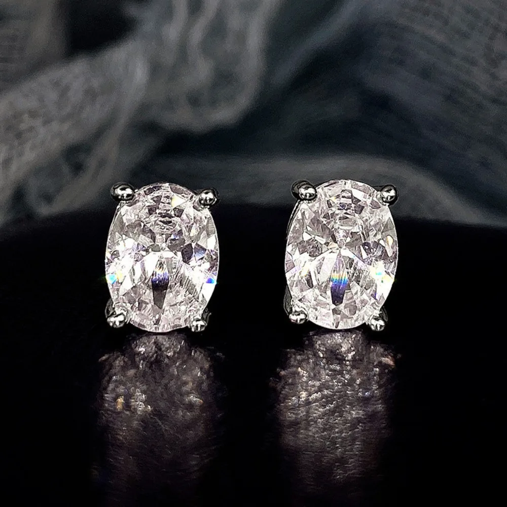 

Luxury Shining Brightly Four Claws Single Drill Oval Colored Zircon Stud Earrings for Women Stainless Steel Jewelry Gift No Fade