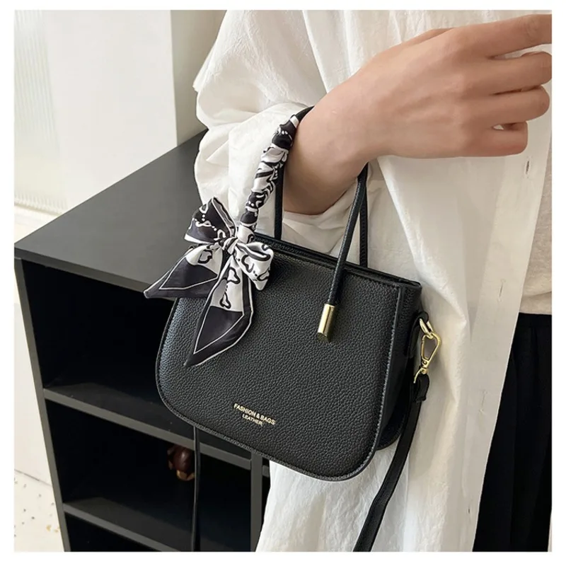 2025 النسخة الكورية الجديدة من الشريط الكتف حقيبة الأم crossbody موضة ركاب قطعتين حقيبة يد متعددة الأغراض الإناث