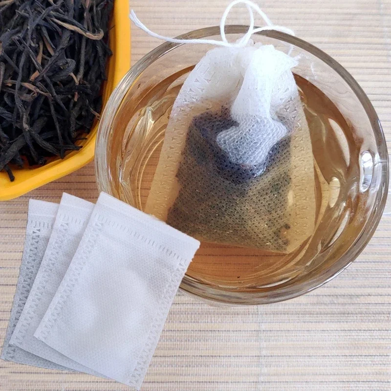 Bolsa de filtro de té desechable de 50/100 piezas, Infusor de té de tela no tejida, con sello de cuerda, bolsa vacía