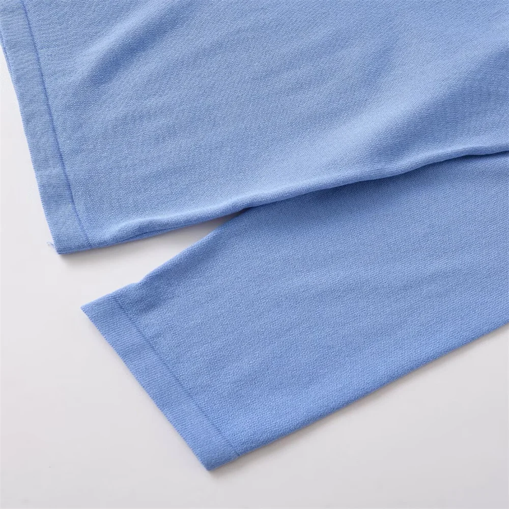 Camicia lavorata a maglia con ago piatto e girocollo allentato con bottoni alla moda delle nuove donne autunnali