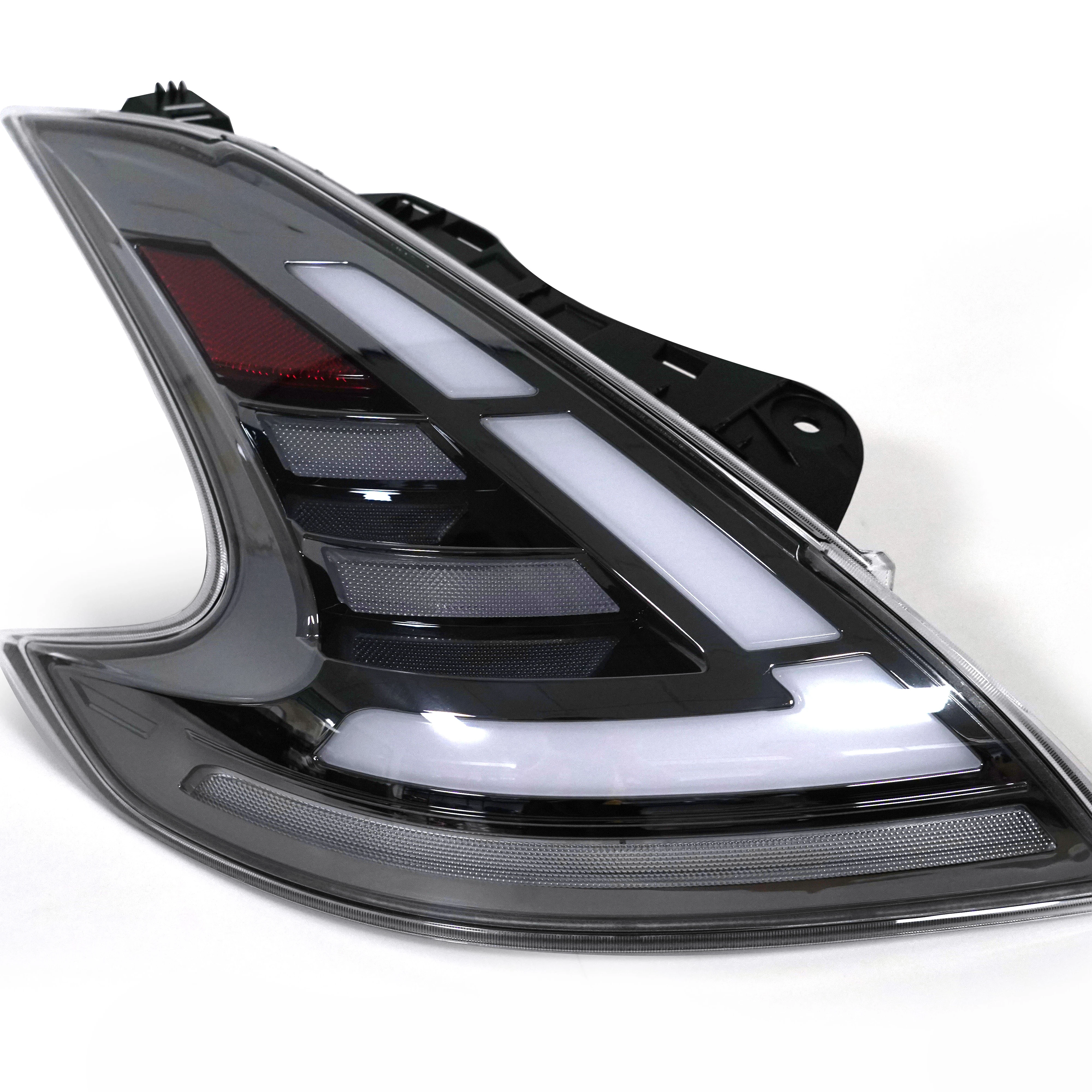 

Upgraded version2013+UP LED Auto Car Rear Lamp Car Accessory LED Tail Lights with Reverse Brake and Turn Signal Fog Lamps for Ni