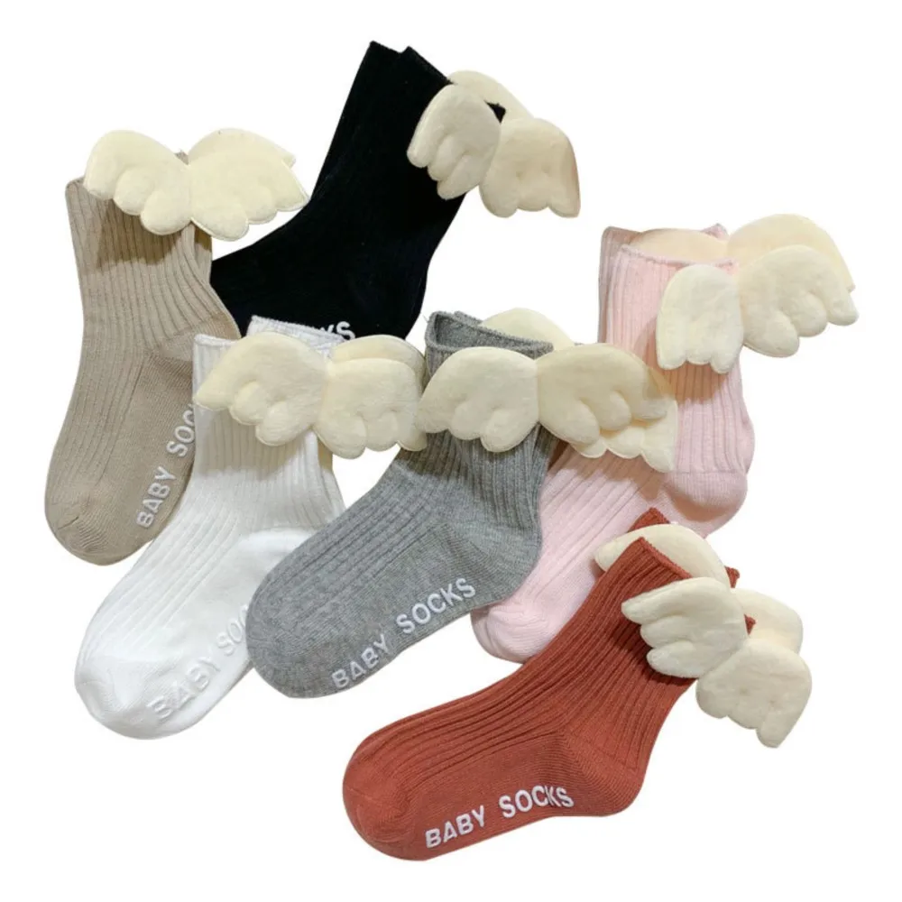 Spring and summer new angel wings children's socks dispensing non-slip boneless double needle tube baby socks.