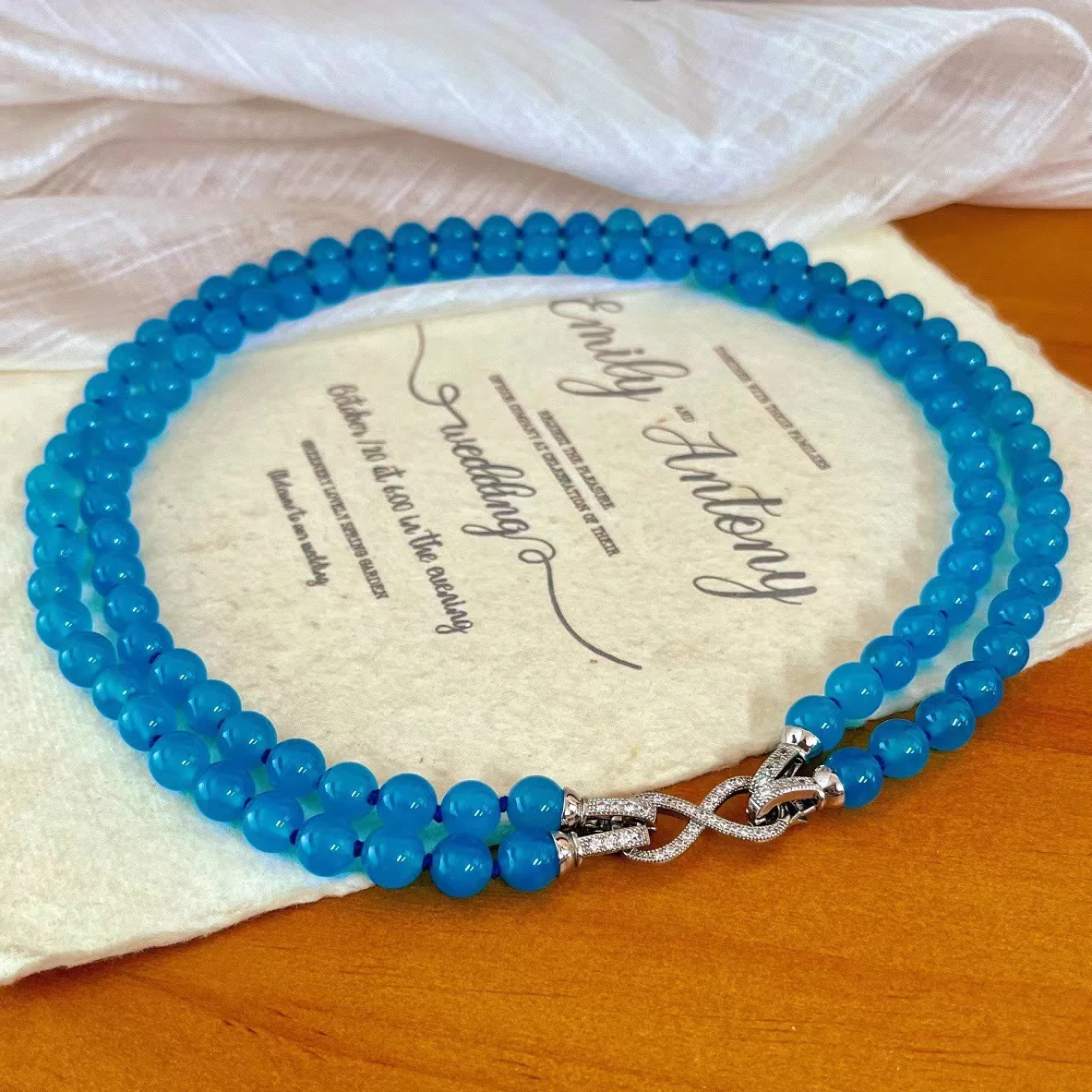 

New retro 8mm natural blue chalcedony double-layer agate necklace, sweater chain, quality knots