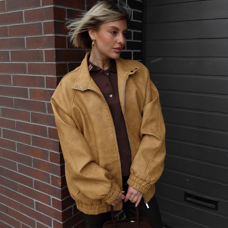 TARUXY Loose Zipper Leather Jacket Women Standing Collar Solid Splicing Long Sleeves PU Leather Coat Autumn High Street Clothing