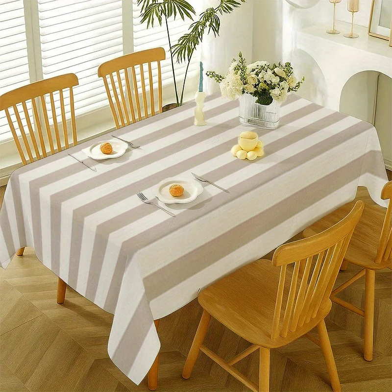 A beige and white striped tablecloth, featuring a soft rectangular design with horizontal brown stripes.
