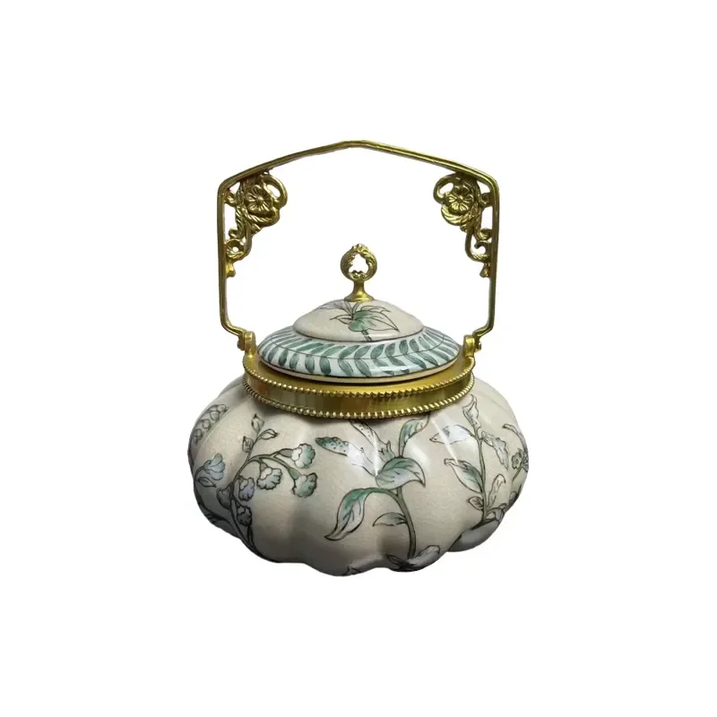 The Latest Design of High Temperature Ceramic Teapot with Brass Hand-held Blue and White Porcelain Teapot Home Decoration