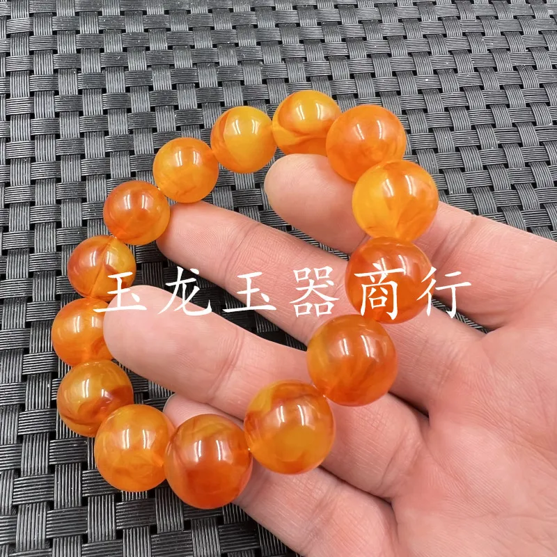 Fluorescent floating saltwater round bead , orange-red second-generation old amber bracelet, unisex couple's brace