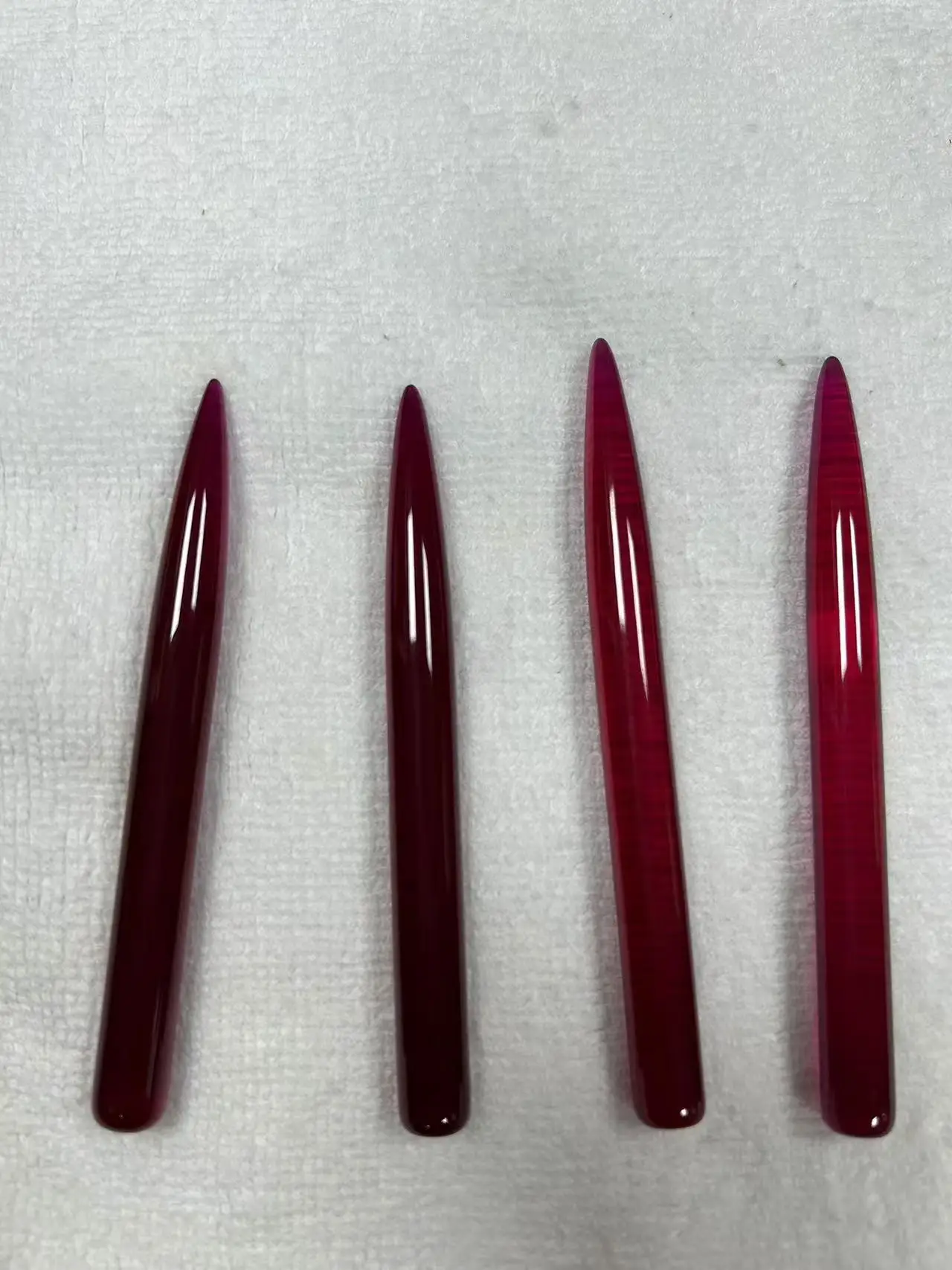 Ruby red corundum pen tip ornaments Hardness 9 Playpieces can be inlaid with various objects diameter 9 mm length about 9 cm