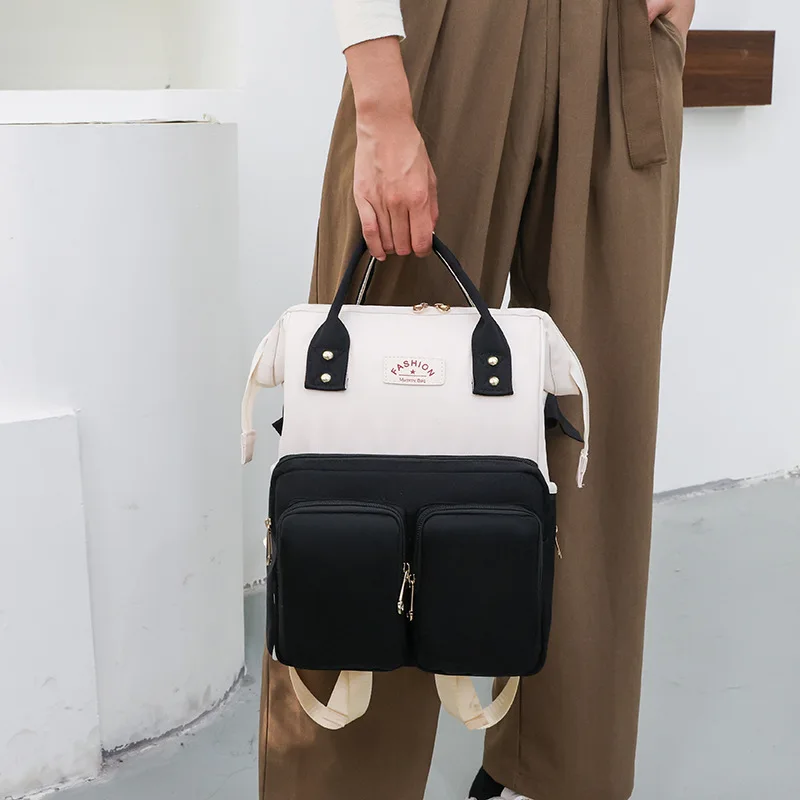 Cute small and fresh storage backpack large capacity fashion mother and baby bag light hand color backpack