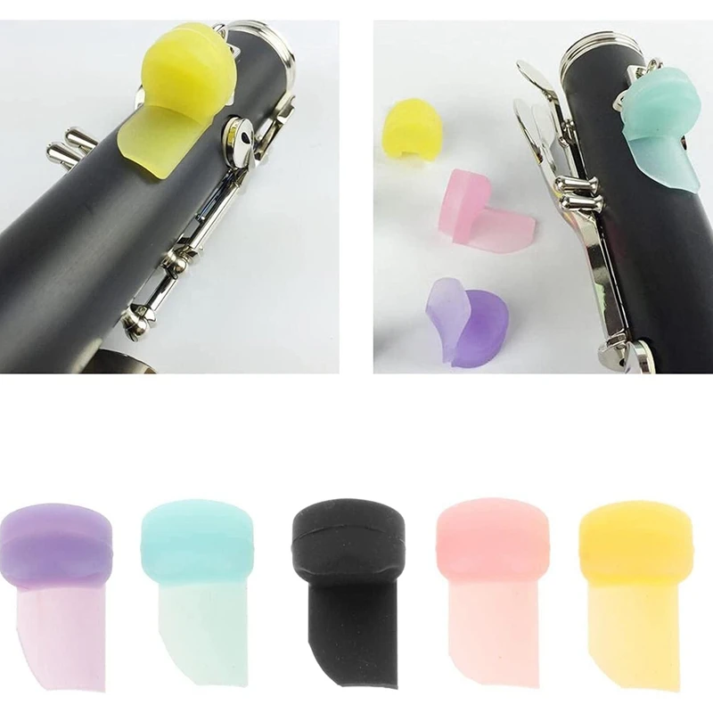 Confezione da 5 clarinetto in Silicone morbido cuscino per poggiapolsi per pollice protezione per pollice per strumento a fiato 5 colori