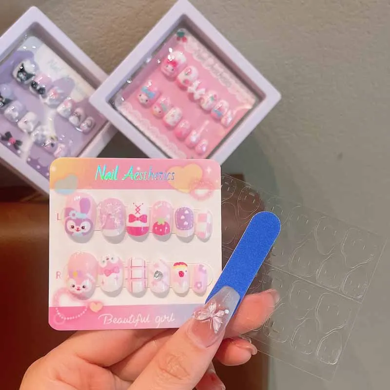12 pièces Sanrio enfant mode mignon dessin animé Kuromi Hello Kitty presse sur ongles autocollants bébé faux ongles filles cadeau filles ongles conseils