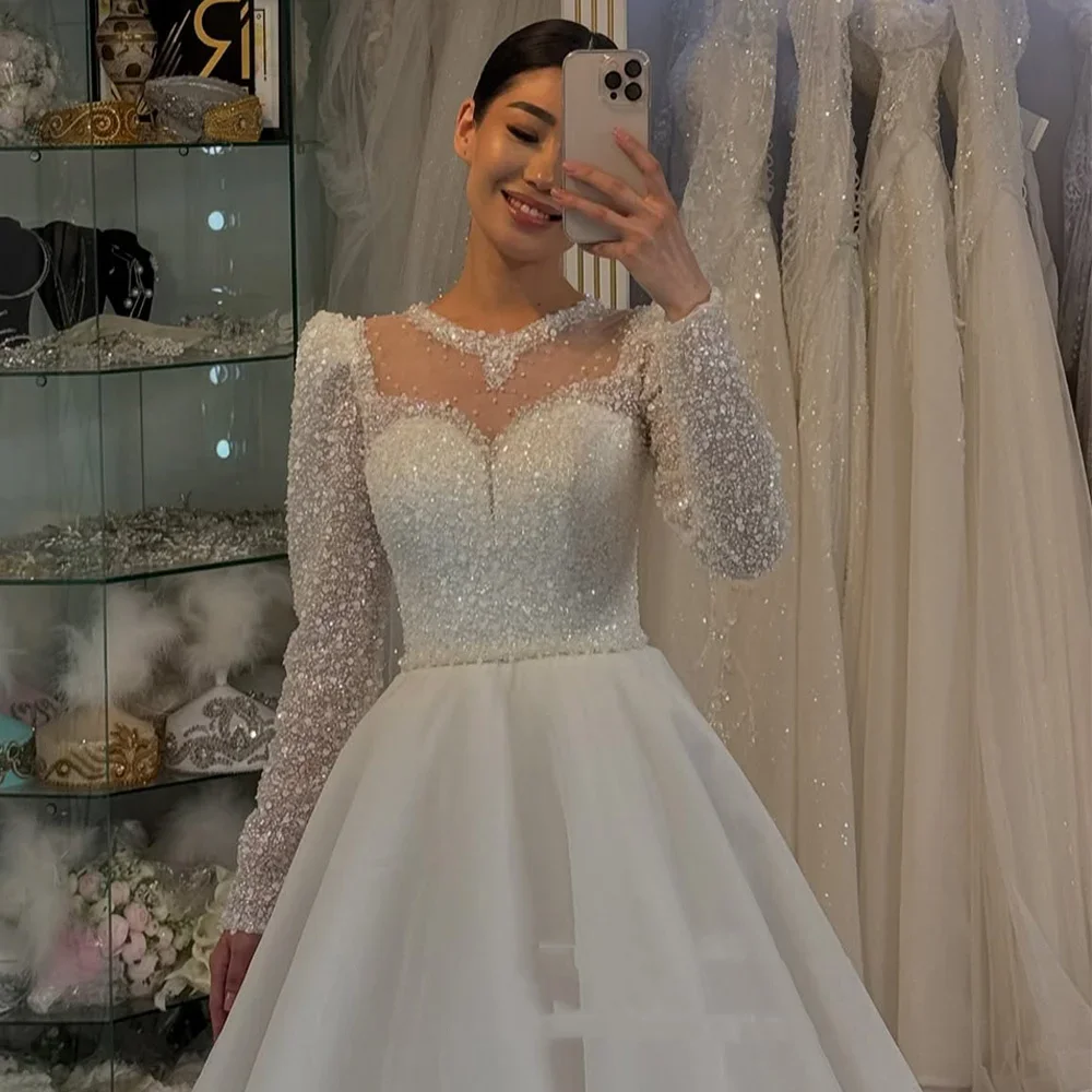 Customized Sparkling Princess Wedding Dresses Round Neck Long Sleeves Beading Sequined A Line Sweep Train Arabian Bridal Gowns