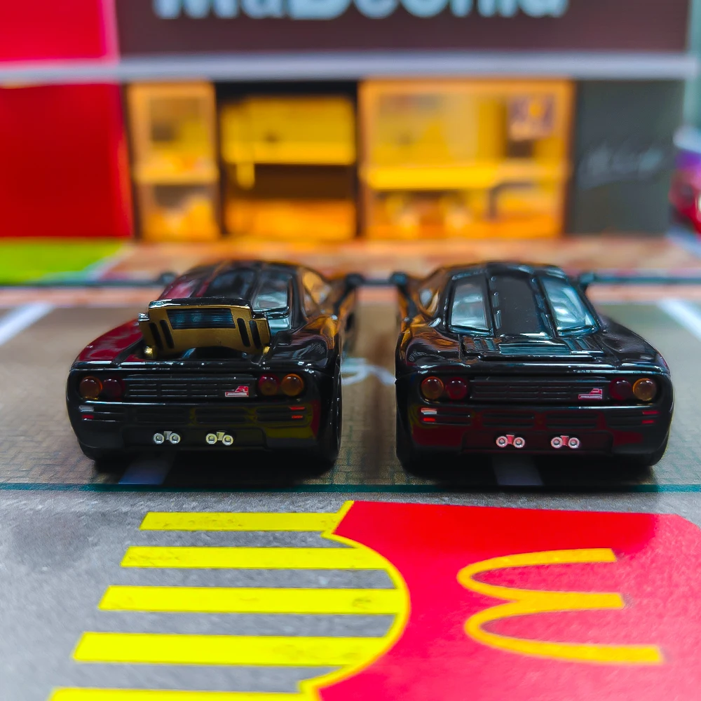 รถโมเดลไดแคสต์ Xcartoys x POP RACE 1:64 F1 สีดำเจ็ท จำนวน 2 คัน (ไม่มีกล่อง)