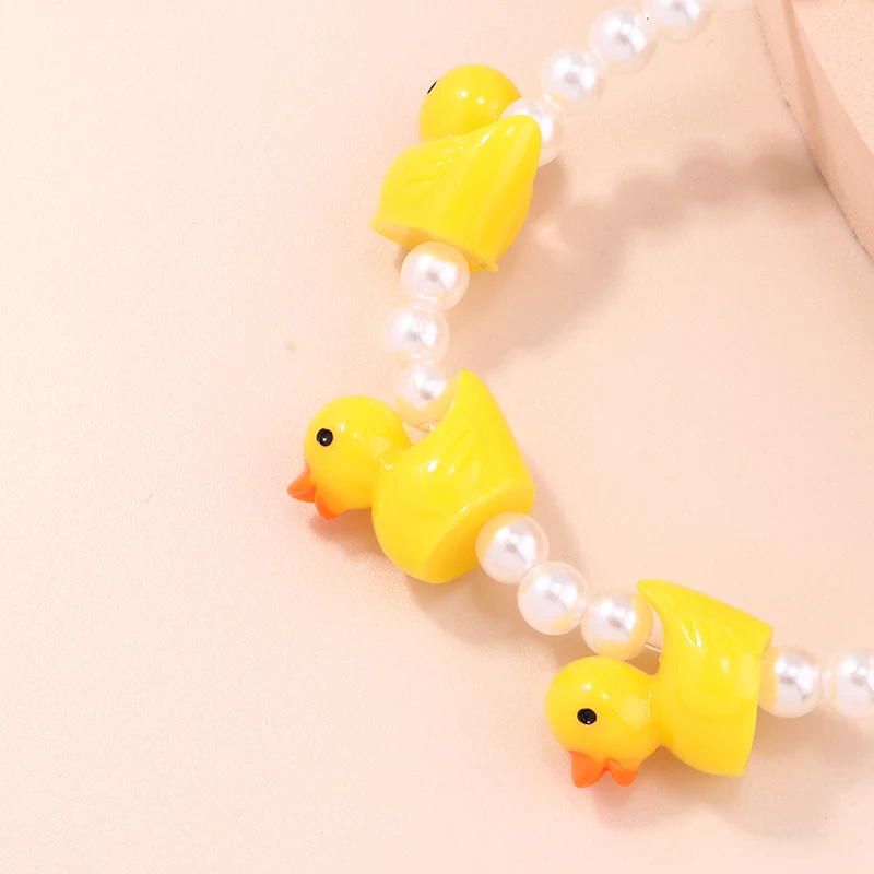Niedliche handgemachte Imitationsperlen-Armbänder für Frauen, Cartoon-gelbe Ente, Charms-Armbänder, Schmuck, DIY-Geburtstagsparty-Geschenke – Detail 5