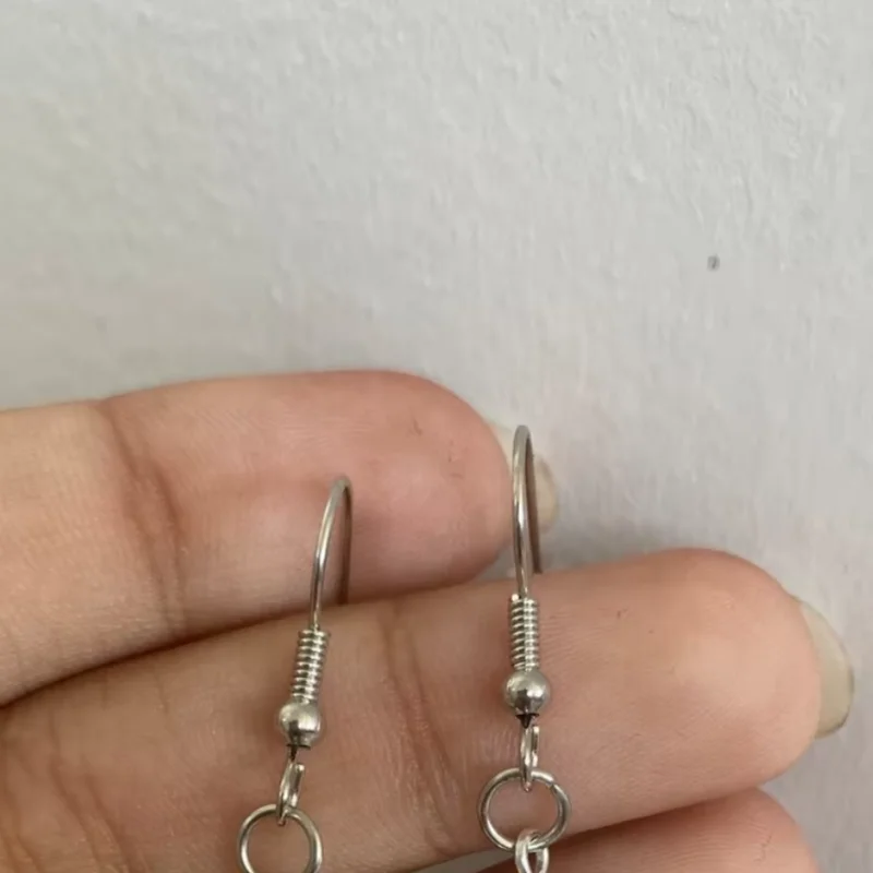 white coquette pearl angel earrings