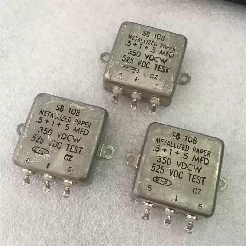 

Антикварный американский CDE 0,5 мкФ + 1 мкФ + 0,5 мкФ 525 В, соединительный масляный конденсатор с желчным пузырем