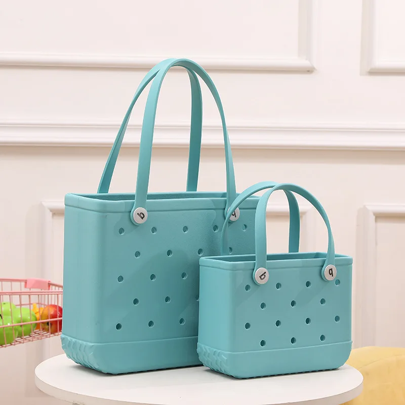 The trendy ladies bags are stylish and minimalist hollowed out candy colored portable vegetable basket bags handbags  bags