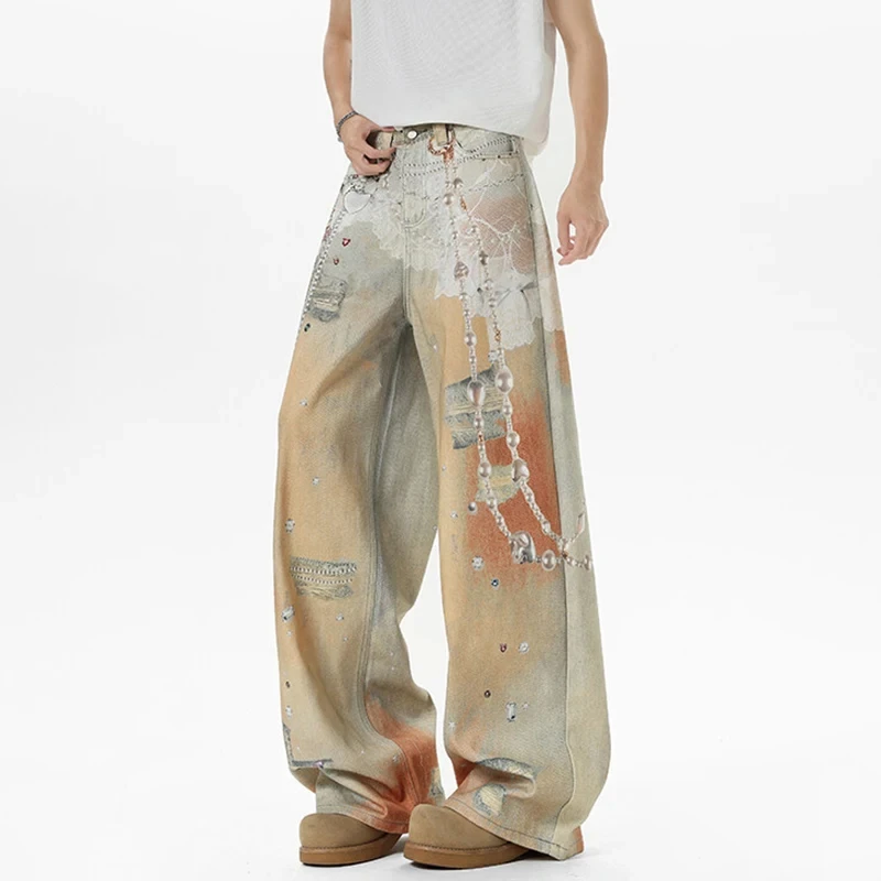 

Новые стильные мужские джинсовые брюки с широкими штанинами в американском стиле High Street с цепочкой и принтом, потертые дизайнерские мешковатые мужские джинсы 2026, весна-лето