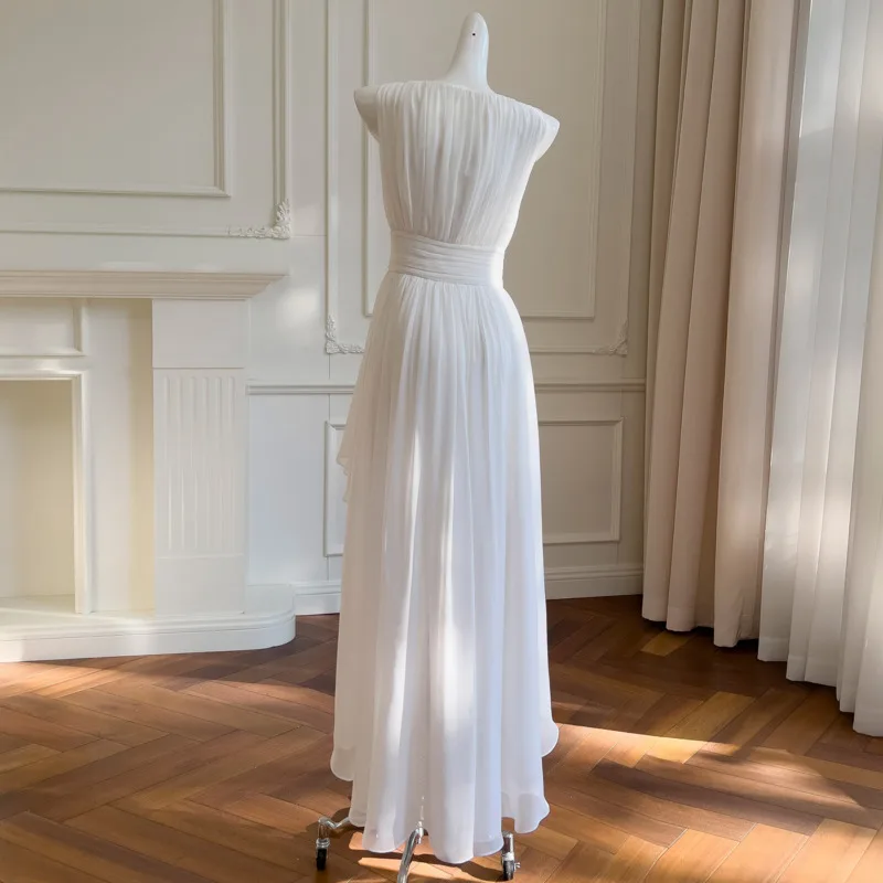 VIBE Lente Zomer Franse Jurk Nieuwe Witte Mouwloze Taille-Knipperende Elegante Onregelmatige Zoom Jurk voor Vrouwen Avondfeest Jurk