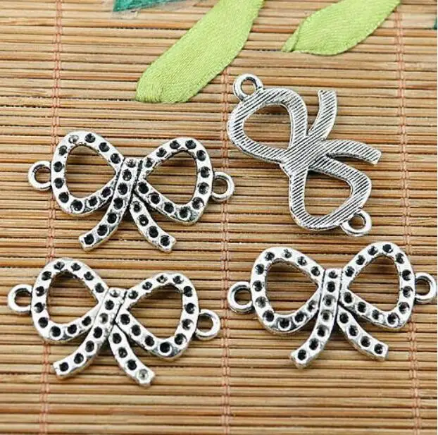 8pcs 34.8*21mm hole 2.6mm tibetan silver tone bow knot design connector EF1983