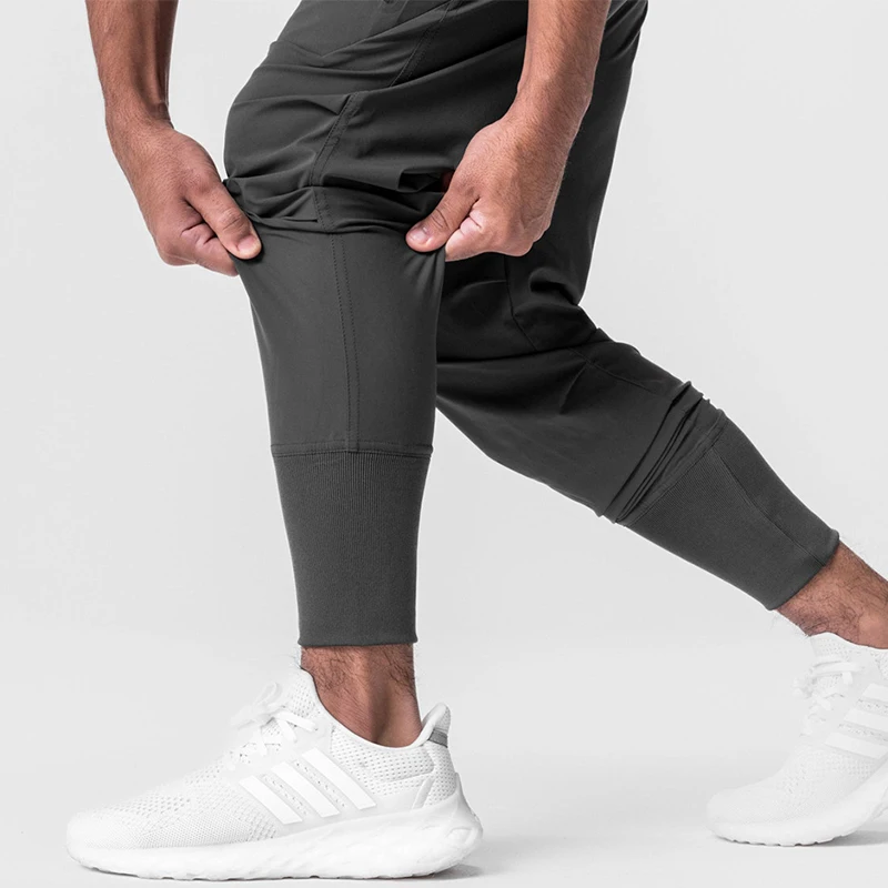 بنطال رياضي للياقة البدنية للرجال بقصة ضيقة للتدريب والجيم والركض ومسار ماراثون فضفاض مناسب ملابس رياضية منسقة