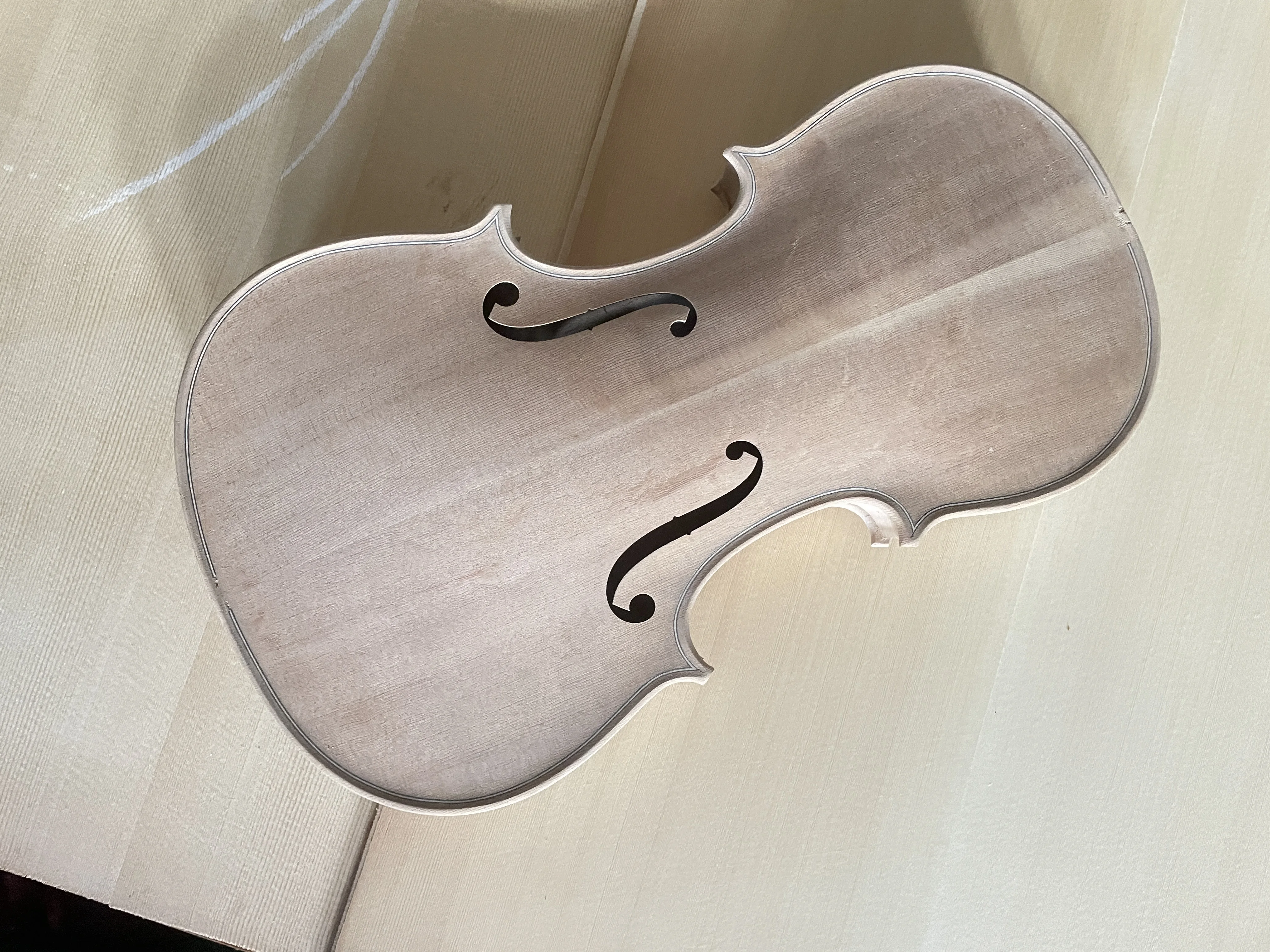 High quality. Unfinished white violin body. 4/4 full board water ripple flame maple, spruce back and solid wood top