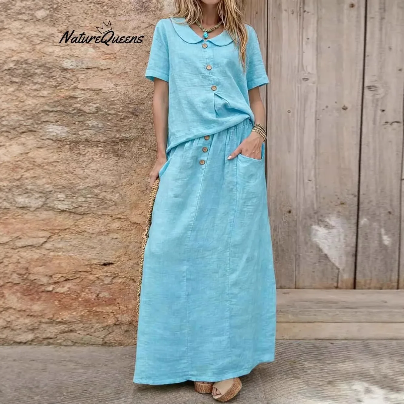 

Women's two-piece short-sleeved doll collar top loose pocket skirt 2026 new casual button cotton and linen solid color suit