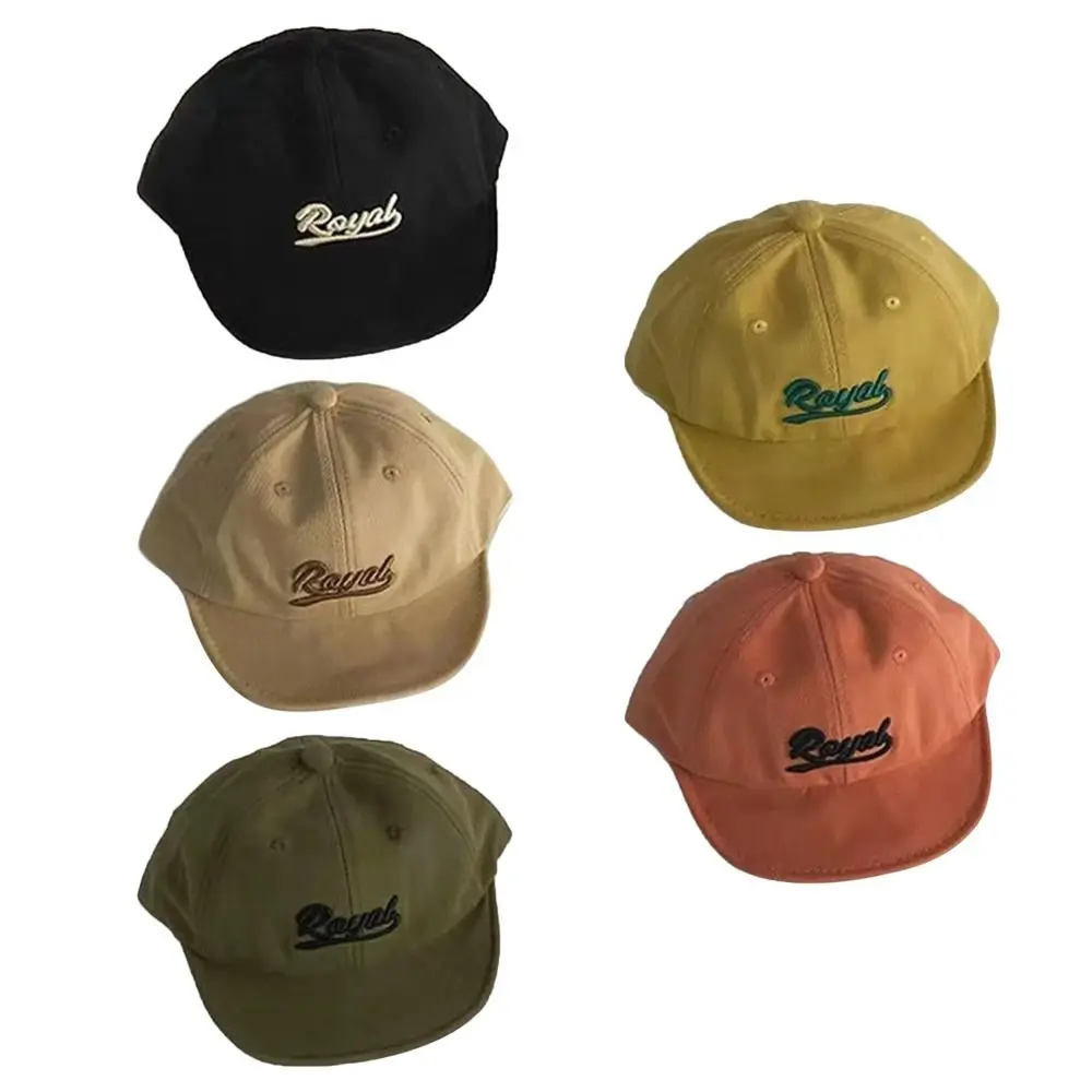 قبعات للأولاد والبنات بلون سادة قبعة للأطفال مطرزة بحروف من القطن والبوليستر قبعة بيسبول للأطفال قبعات بلغت ذروتها