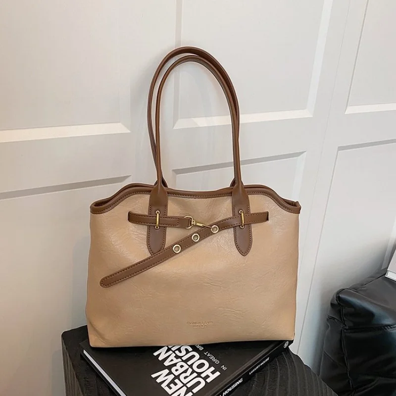 

Famous Designer Hand Bags For Ladies, Soft Leather With Decorative Tassels, Chic And Functional For Evening Or Day Use