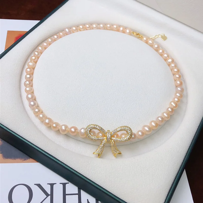 

Natural Freshwater Pearl Bow Necklace Wedding Dress Collarbone Chain Light Luxury Women's Necklace Elegant Versatile Fashion Mus