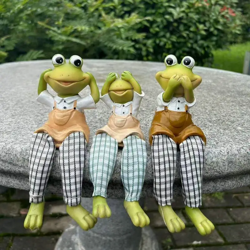 لا تستمع، لا تبدو، لا تتحدث زخرفة الضفدع