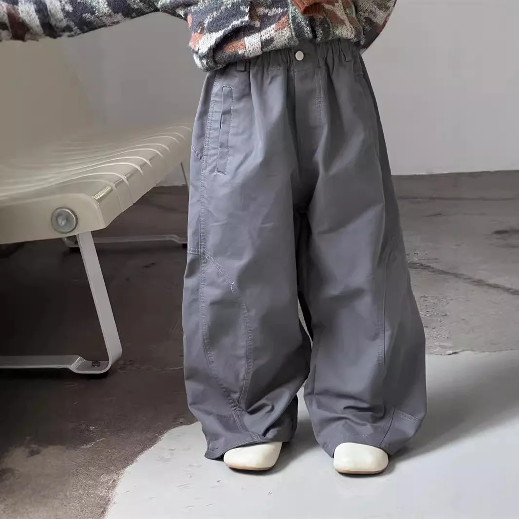 سراويل الأطفال للربيع والخريف النسخة الكورية الجديدة سراويل فضفاضة غير رسمية متعددة الاستخدامات يومية بلون سادة متعددة الاستخدامات