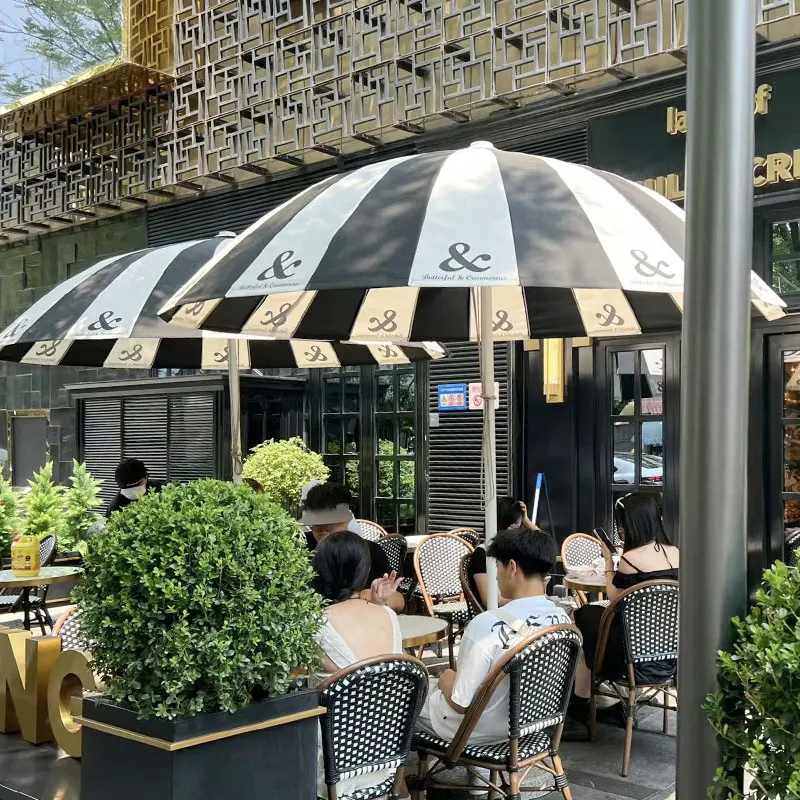 Paraguas de setas para exteriores Cafe Hotel