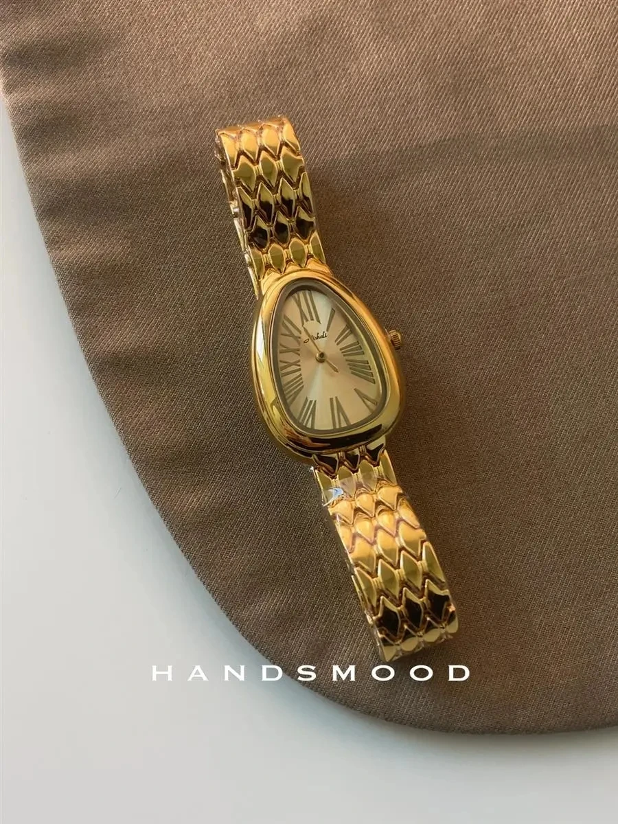 ضوء الفاخرة المتخصصة الأفعى رئيس المرأة ساعة كوارتز الراقية مزاجه سوار ساعة نسائية ثعبان سلسلة ساعة نسائية هدية