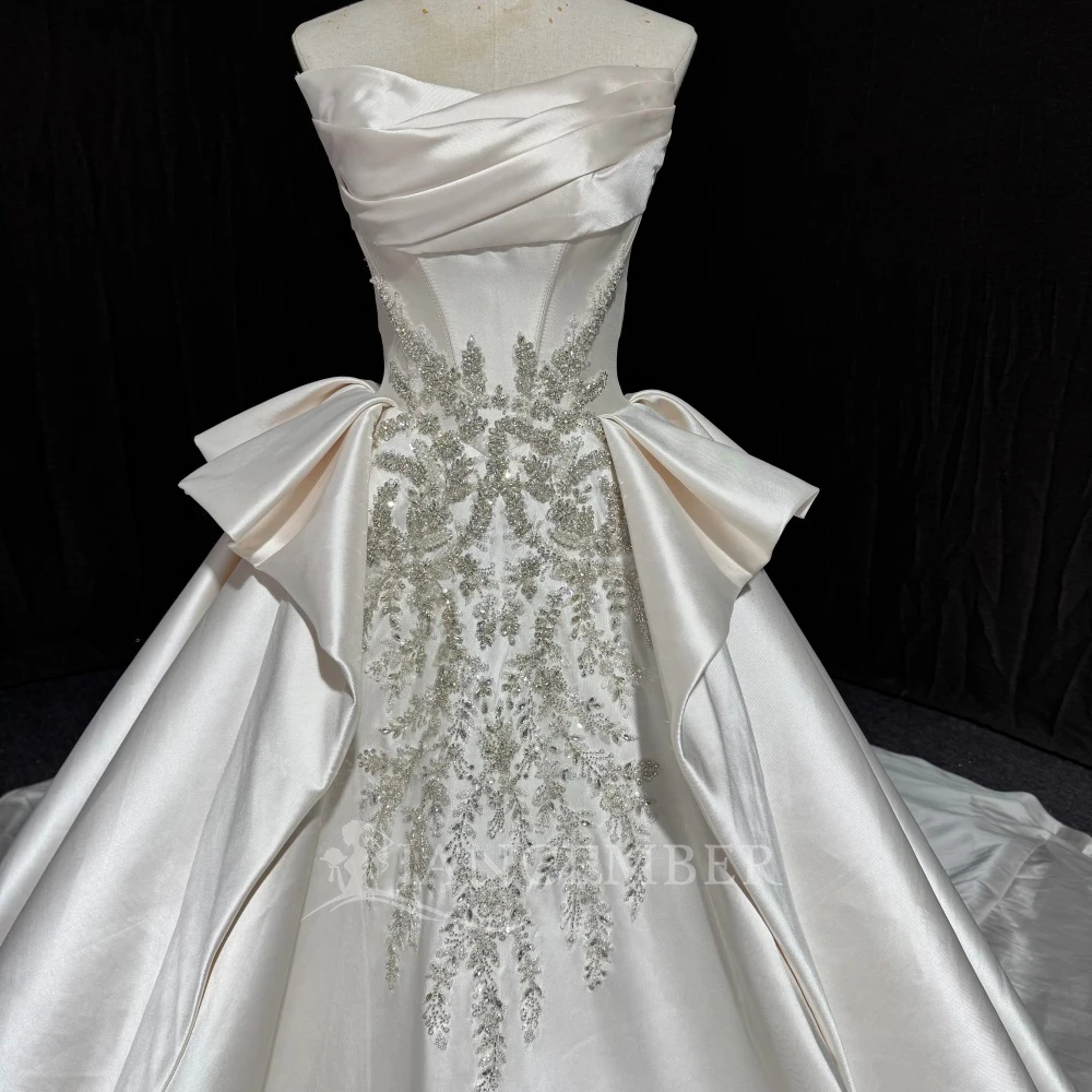 ノースリーブのボールガウンウェディングドレス2025、ストラップレスサテン、花嫁パーティー、プリンセス、卸売、コートトレイン、カスタムメイド、ベスティード・デ・ノイバ