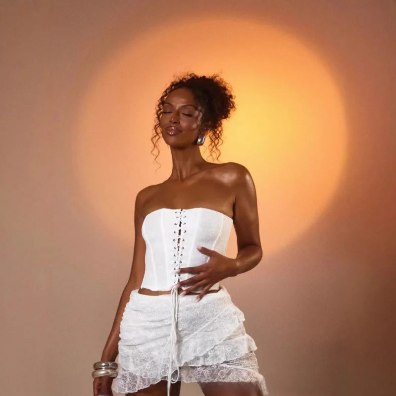 Conjunto de falda ajustada de encaje con tirantes de espina de pescado elegante a la moda europea y americana para mujer nuevo