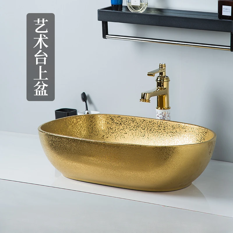 Simple European style light luxury gold-plated countertop basin oval ceramic washbasin single basin hotel clubhouse gold wash