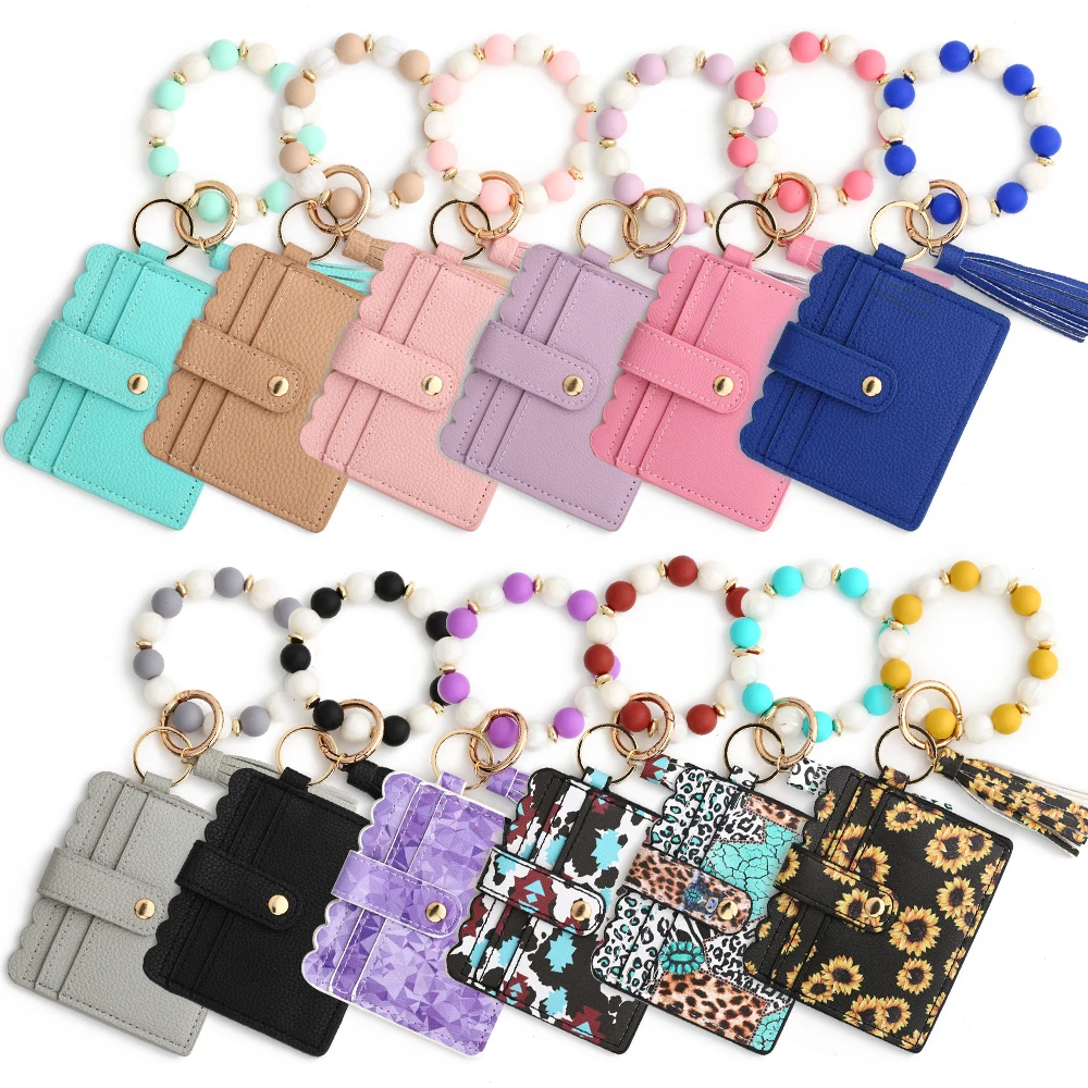 

2024 Silicone Bead Bracelet Solid Leather Card Bag Wristlet Keychain Silicone Beaded Bracelet Leather Tassel Wallet Bangle