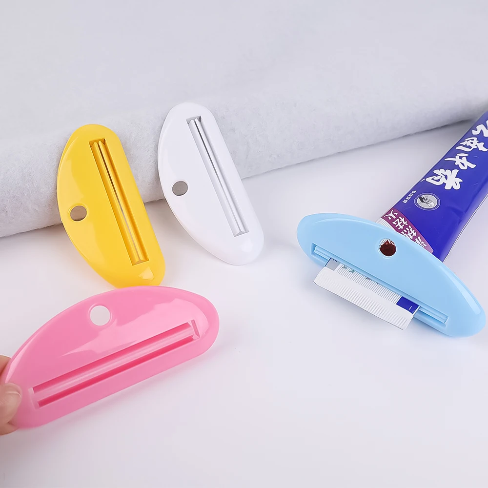 Exprimidor de tubo de pasta de dientes de plástico, Clips dispensadores de pasta de dientes ahorradores, soporte exprimidor de crema de limpieza para el baño, accesorios para el hogar