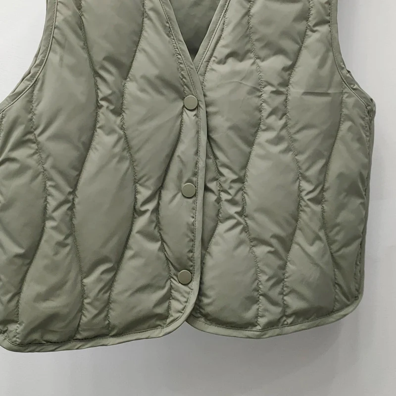 Schinteon เสื้อกั๊กขนเป็ดสีขาวน้ำหนักเบามากสำหรับผู้หญิงแจ็คเก็ตแขนกุดคอวีคอปกเสื้อซับในแฟชั่นฤดูใบไม้ร่วงฤดูหนาว2023ใหม่