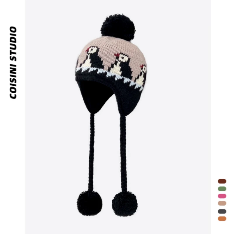 Gorro de punto con protección para los oídos de Jacquard de pingüino de dibujos animados coreano para hombres y mujeres, gorros de bombardero con cordones y bolas de pelo cálidas para invierno