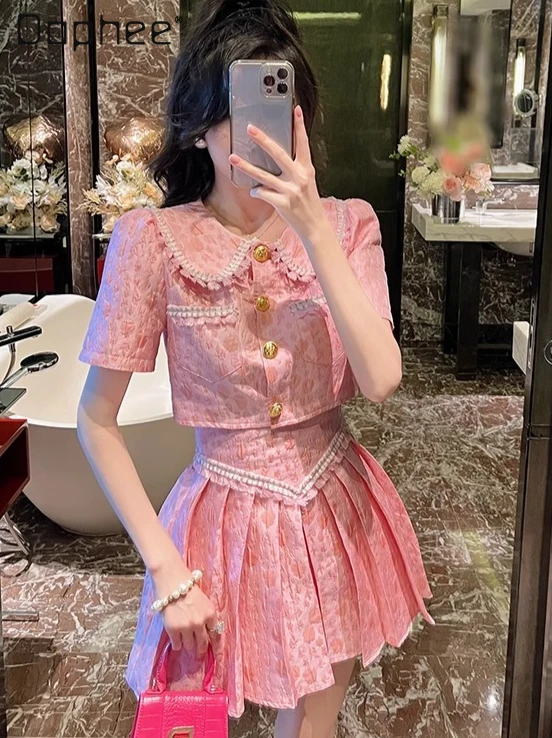 

High Sense Princess Temperament Pink Suit Sweet Doll Collar Bubble Sleeve Short Top High Waist Mini Pleated Skirt Two-piece Set